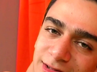 Skinny Latin gay twink wanks cock in solo action at home